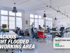 Desks in a light flooded coworking space - Kreuzberg